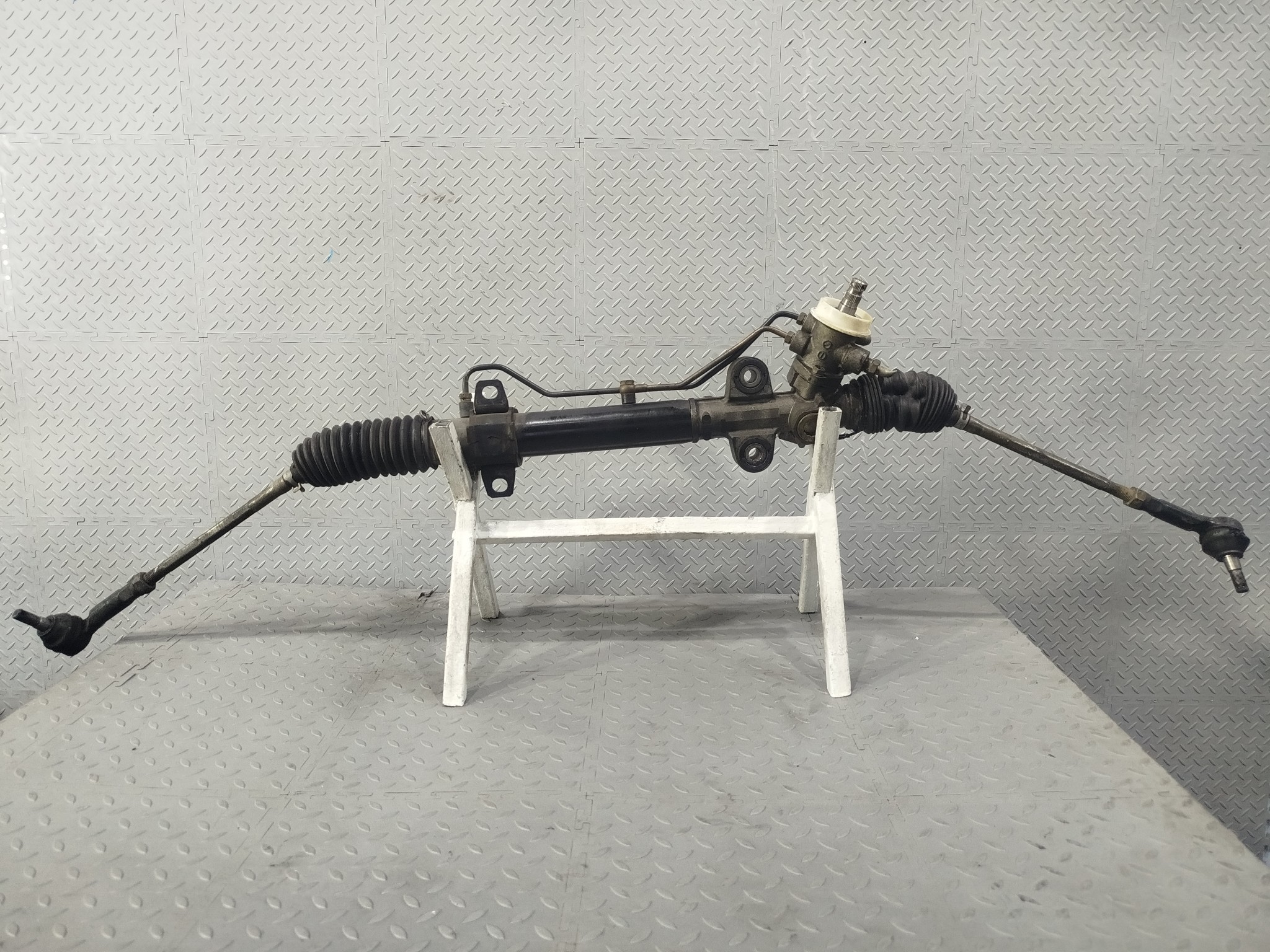 РЕЙКА РУЛЕВАЯ MAZDA B25D32110C  GE347