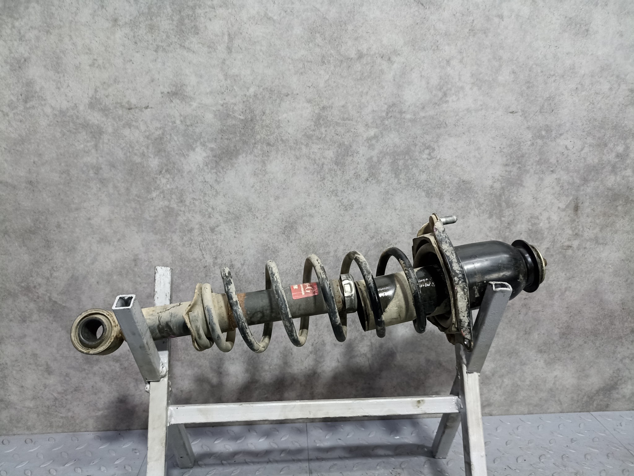 СТОЙКА ХОДОВКИ TOYOTA ЗАДНЯЯ ЛЕВАЯ 4853069245  YE117