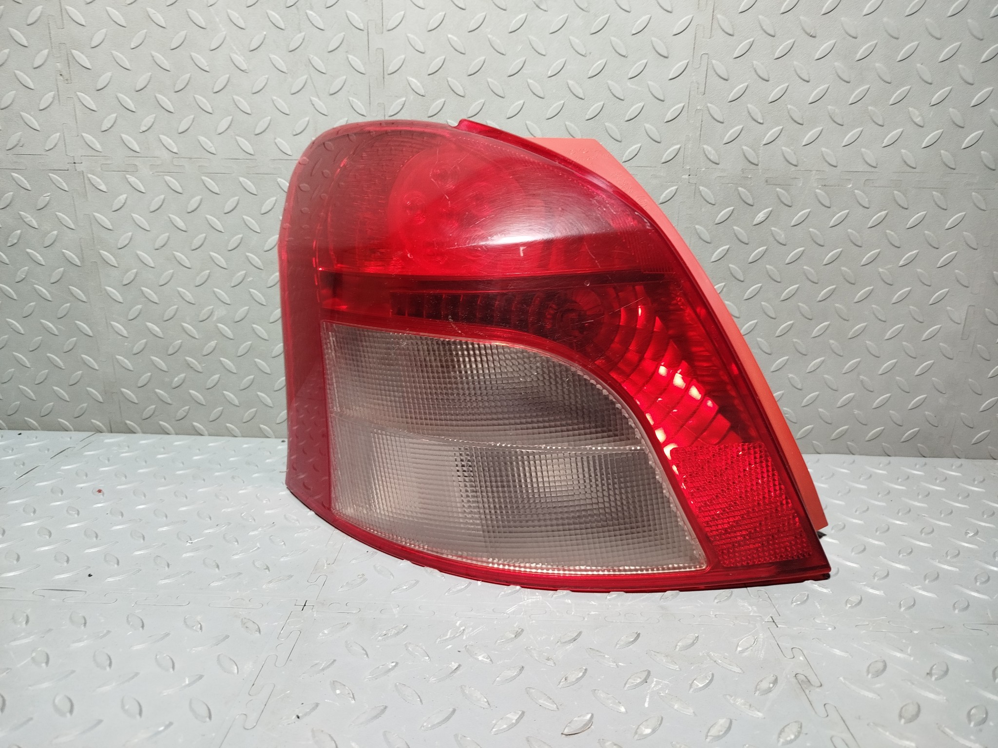 ФОНАРЬ TOYOTA ЛЕВЫЙ 8156052470  XA7780