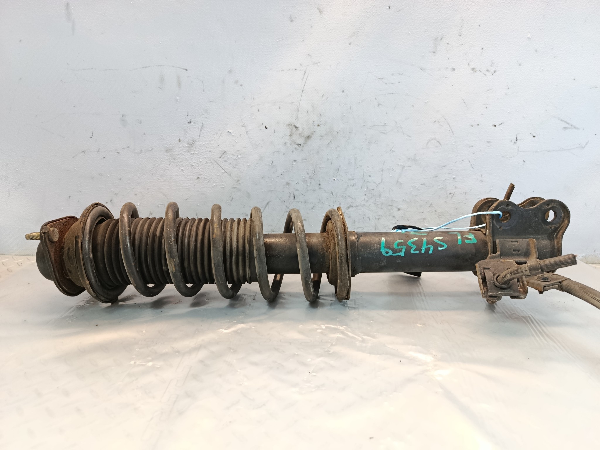 СТОЙКА ХОДОВКИ NISSAN ПЕРЕДНЯЯ ЛЕВАЯ E430341B85  S4359