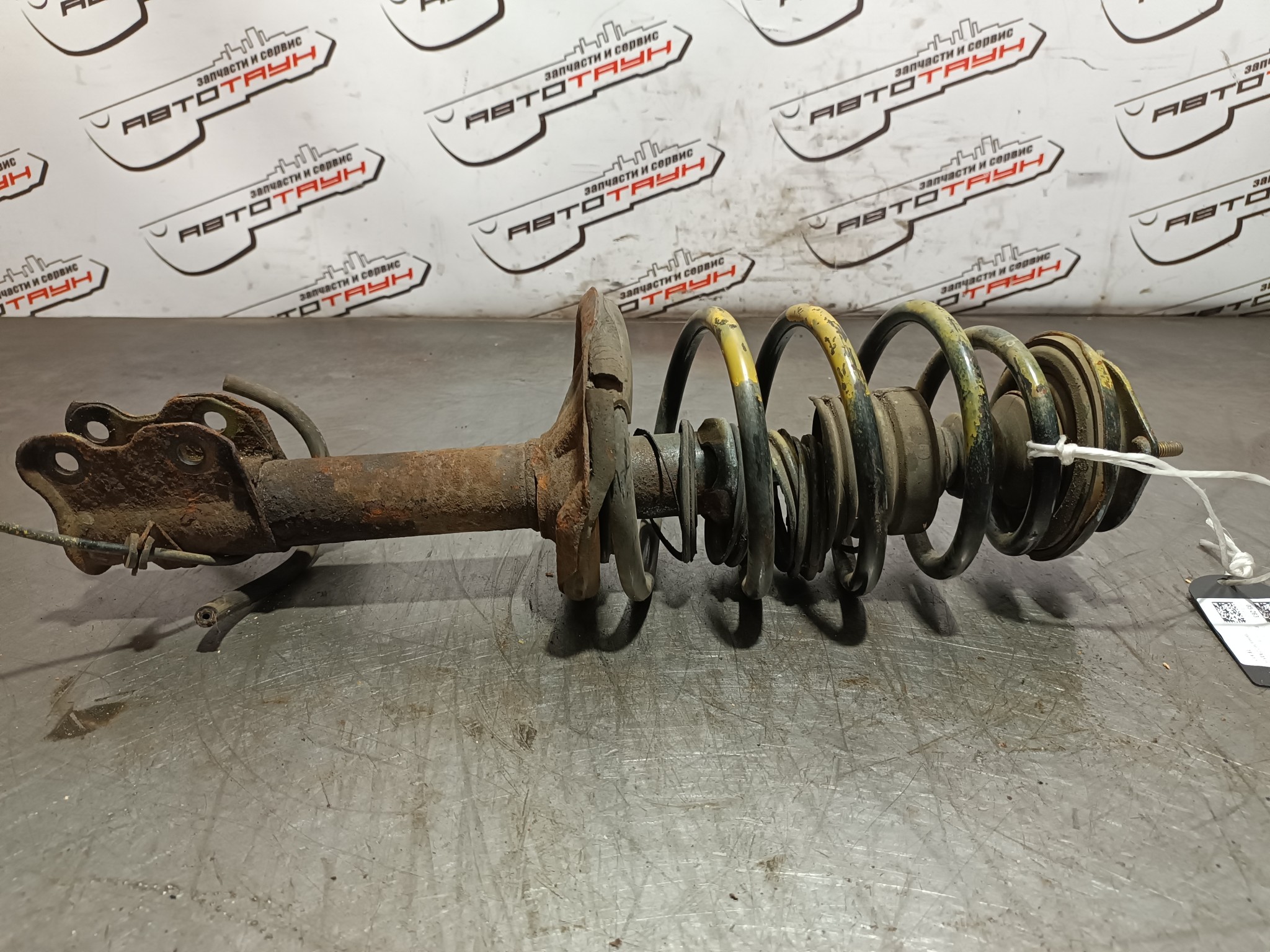 СТОЙКА ХОДОВКИ NISSAN MAZDA ПЕРЕДНЯЯ ЛЕВАЯ 54303WD226  TE112