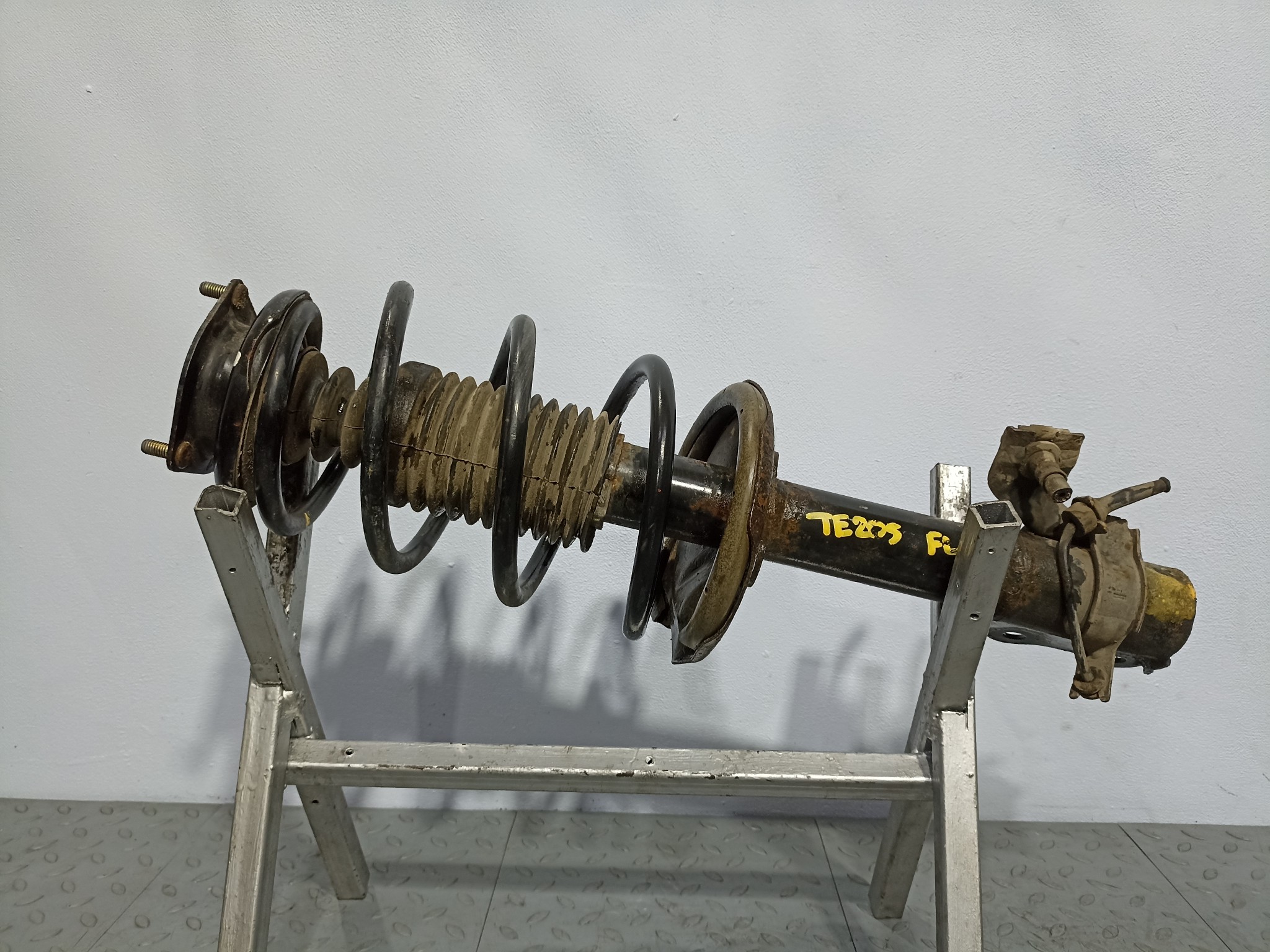 СТОЙКА ХОДОВКИ NISSAN MAZDA ПЕРЕДНЯЯ ЛЕВАЯ 54303WD226  TE205