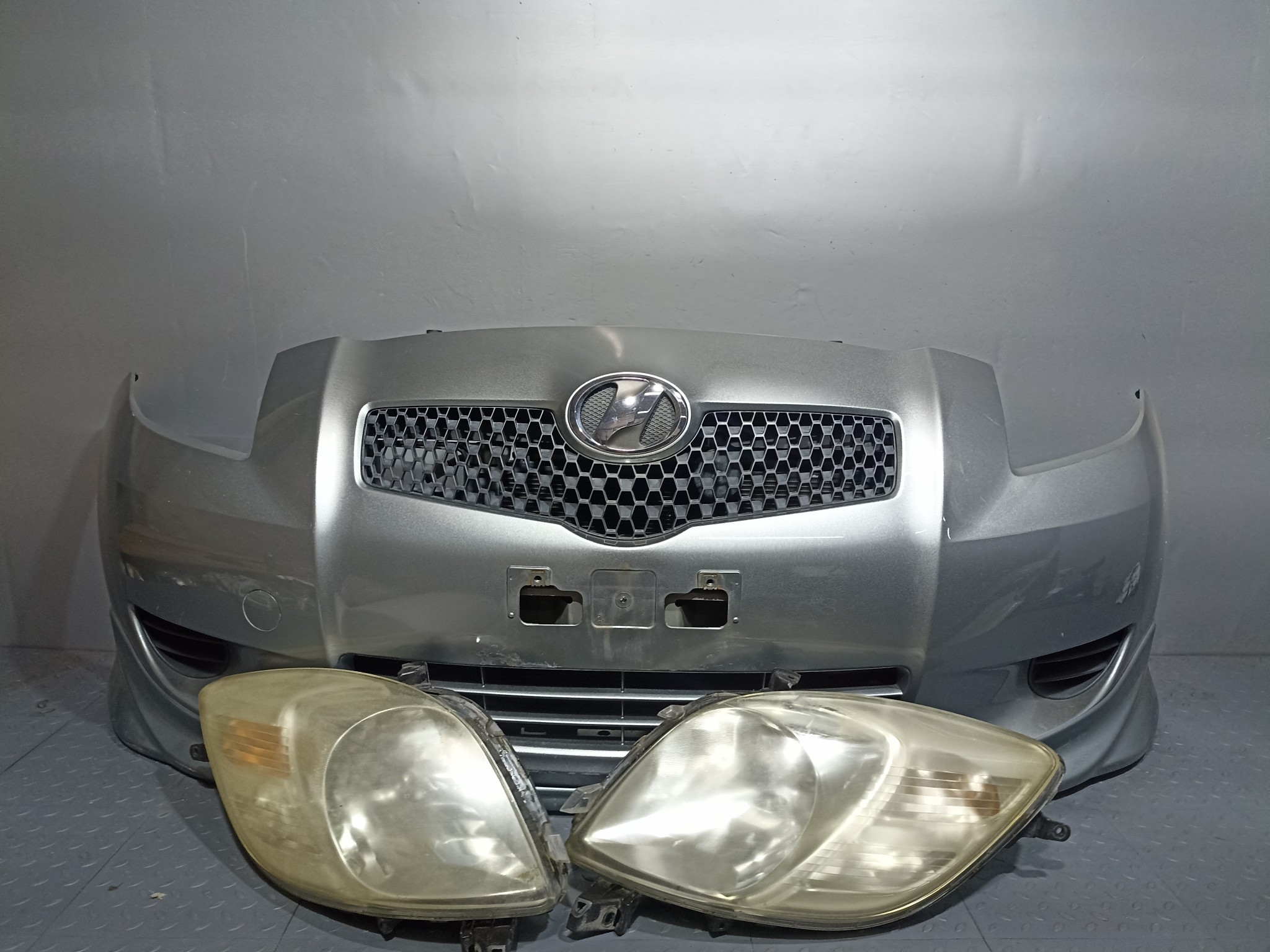 НОУСКАТ TOYOTA VITZ YARIS 5211952410B0 серый, 1F8 TA2073