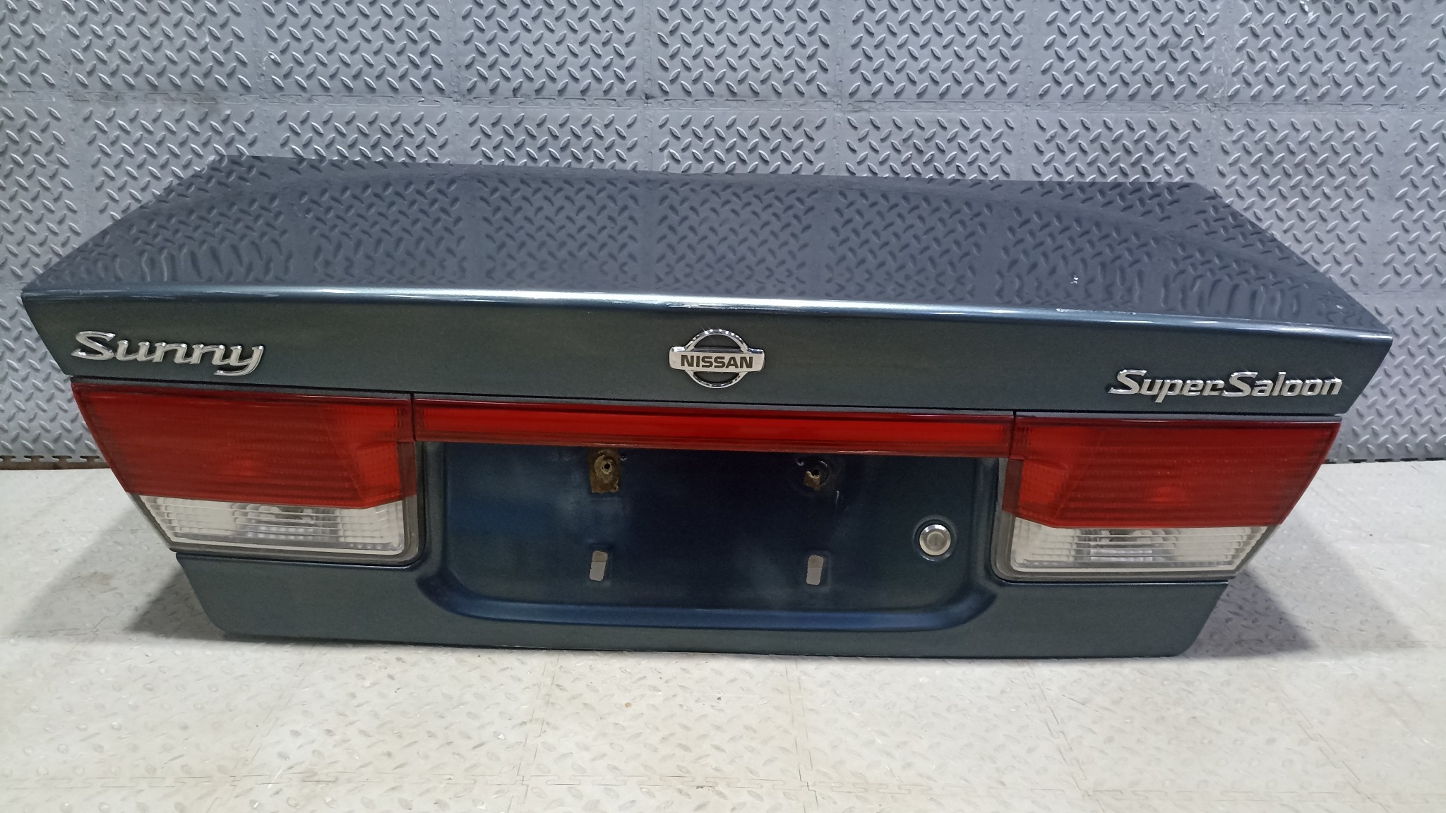 КРЫШКА БАГАЖНИКА NISSAN SUNNY H43004M4CM темно-зеленый, BV5 TE203
