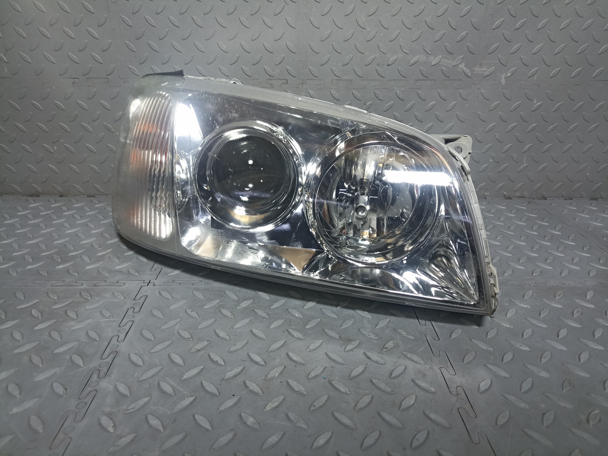 ФАРА HYUNDAI ПРАВАЯ 9210139590 TA1883