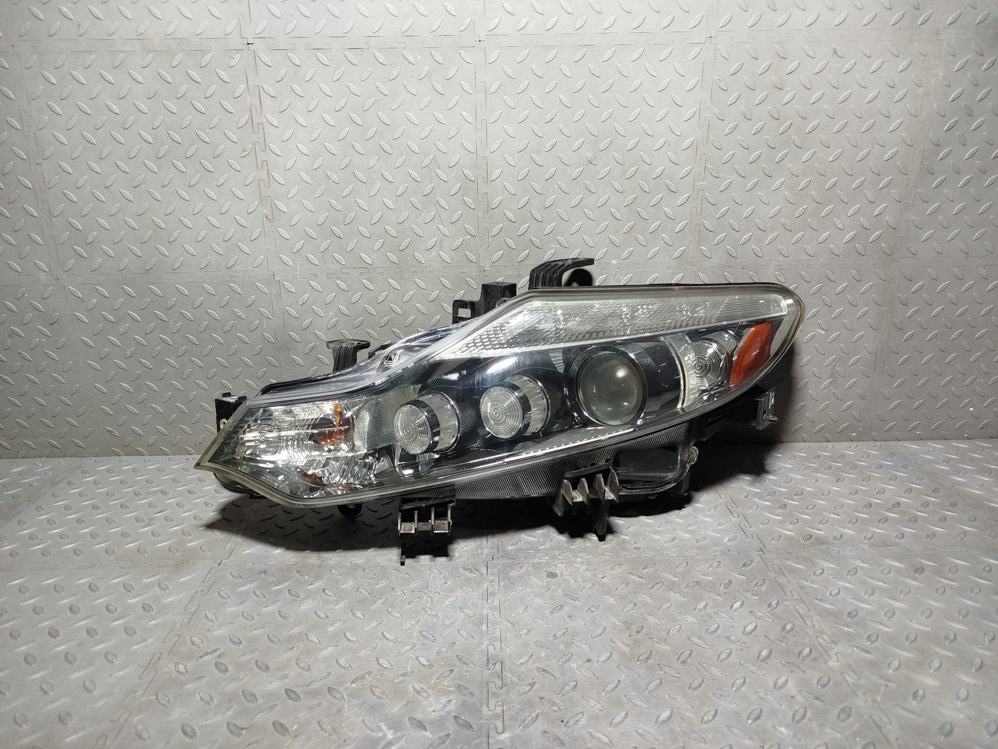 ФАРА NISSAN ЛЕВАЯ 260601AN1A  DY879Z