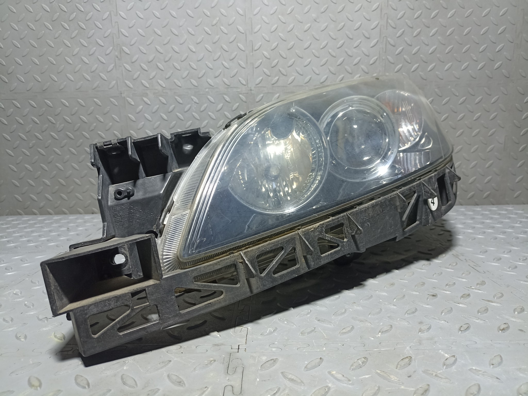 ФАРА MAZDA ЛЕВАЯ B33D510L0B XA7765