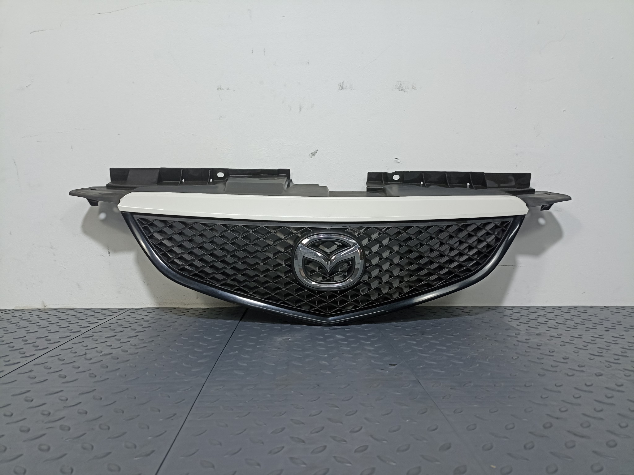 РЕШЕТКА РАДИАТОРА MAZDA LD4750710 S4314Z