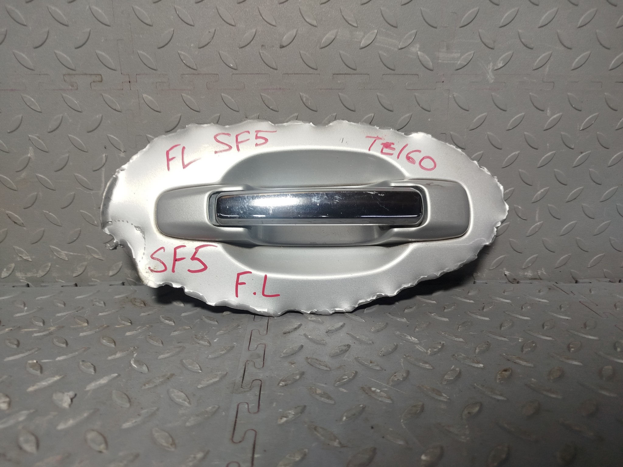 РУЧКА ДВЕРИ ВНЕШНЯЯ SUBARU ПЕРЕДНЯЯ ЛЕВАЯ 62410FC150SJ  серебро, 406 TE160