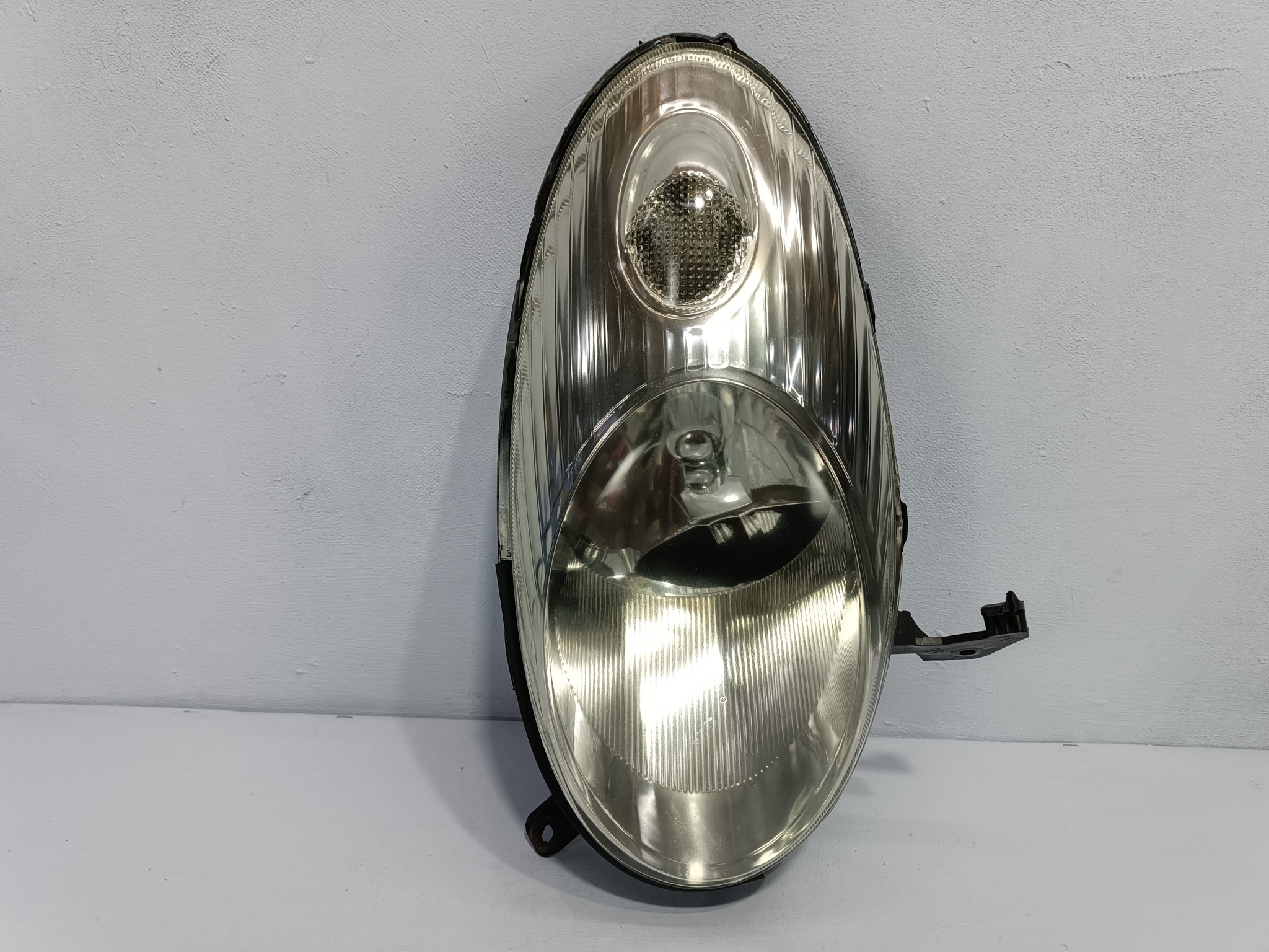 ФАРА NISSAN ЛЕВАЯ 26060AX226 XA7518