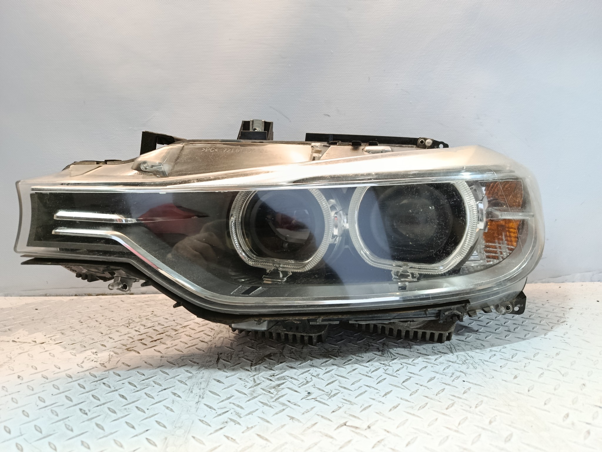 ФАРА BMW ЛЕВАЯ 63117338699 DY844Z