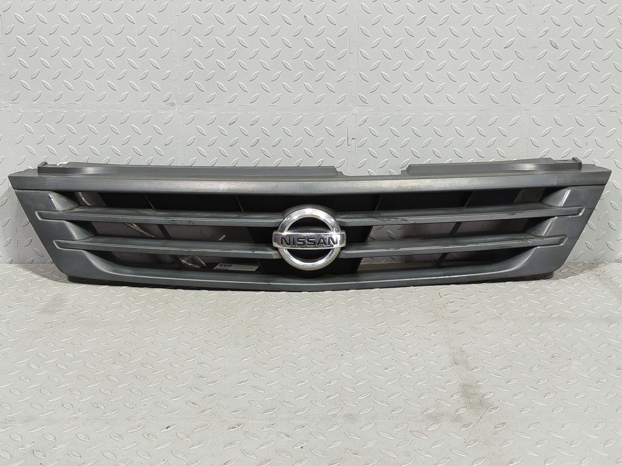 РЕШЕТКА РАДИАТОРА NISSAN 62310WE400  KE523Z