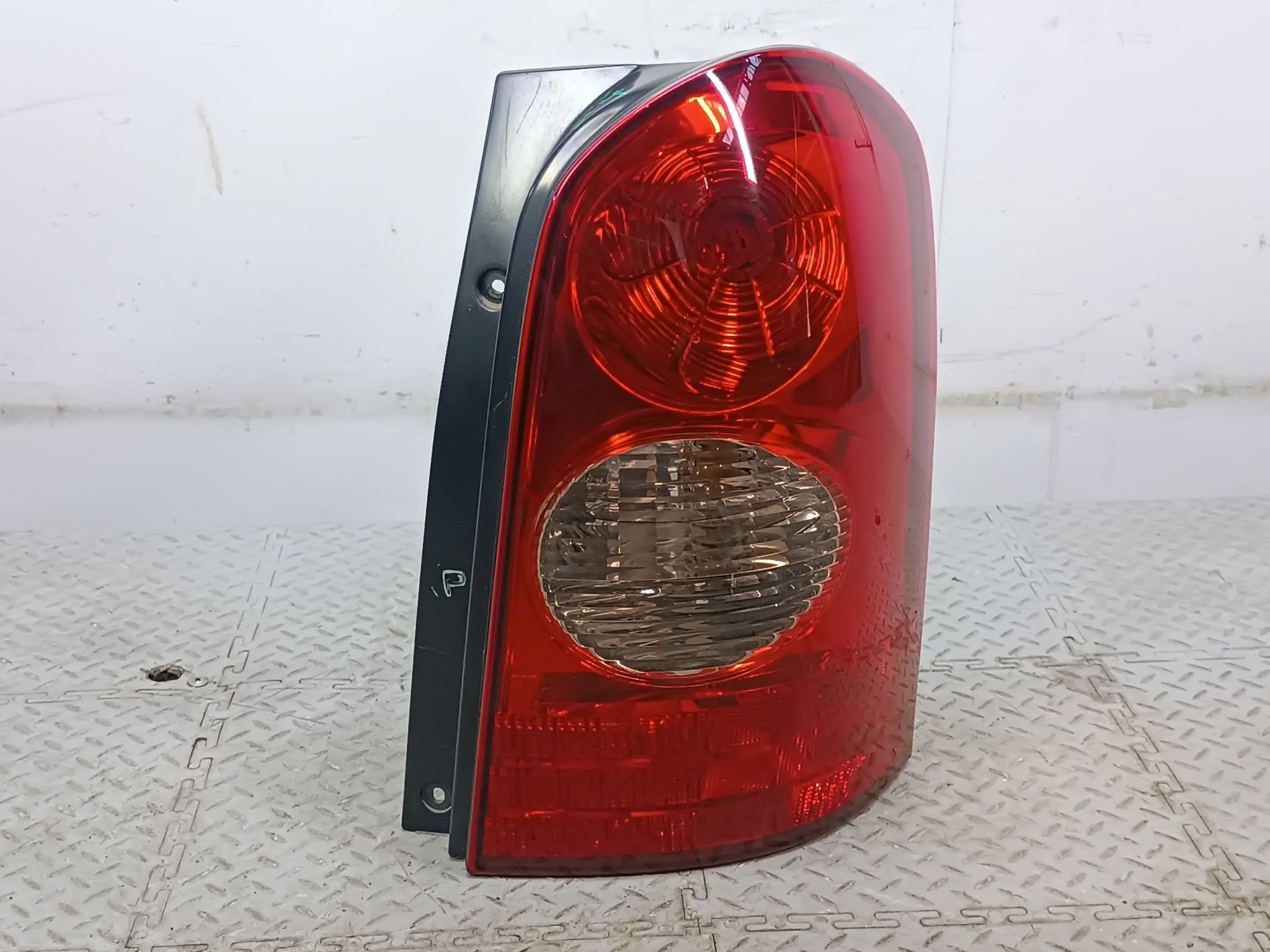 ФОНАРЬ MAZDA ПРАВЫЙ L12051150B  S4314
