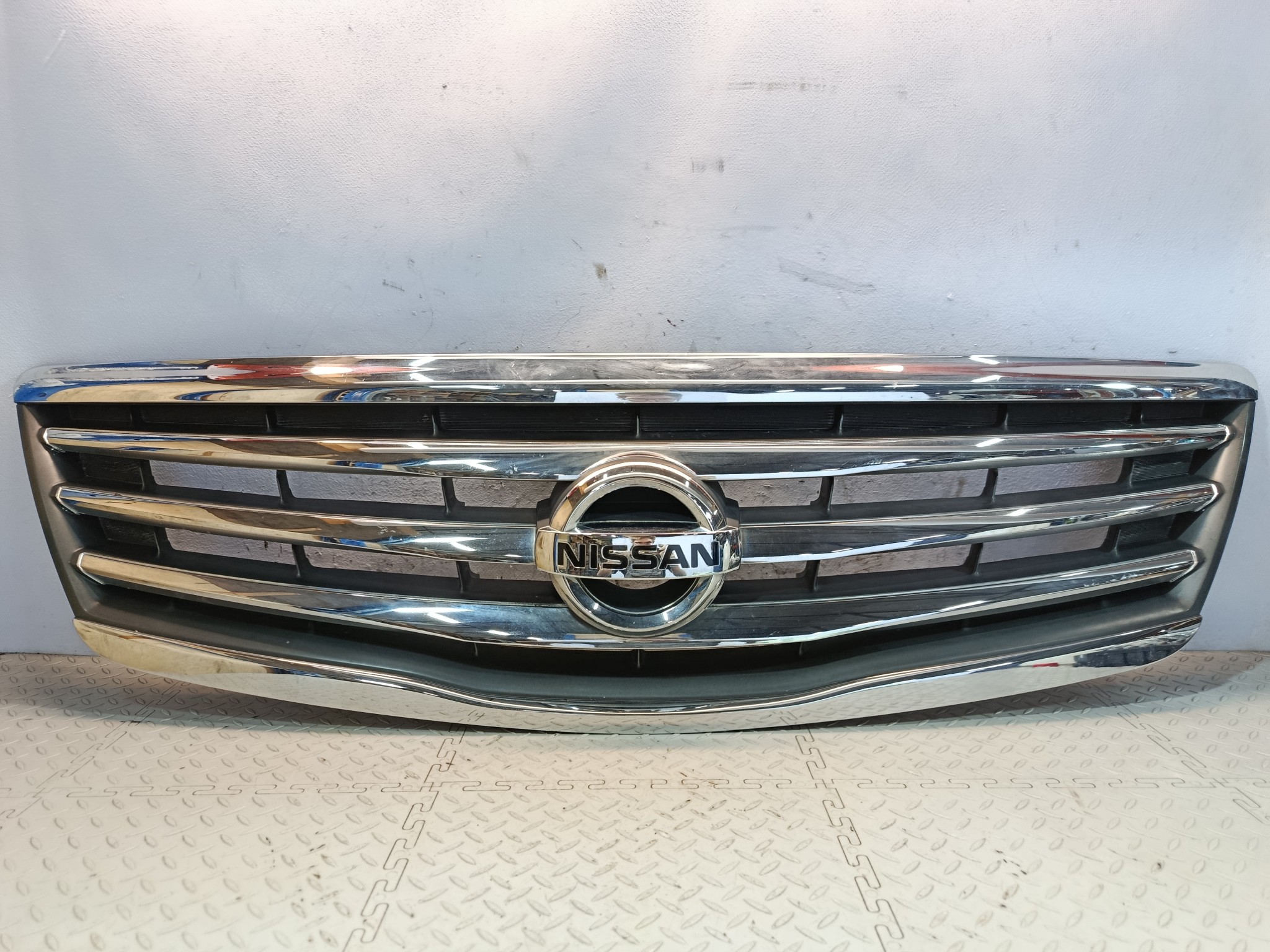 РЕШЕТКА РАДИАТОРА NISSAN 62310JN00A KB2177