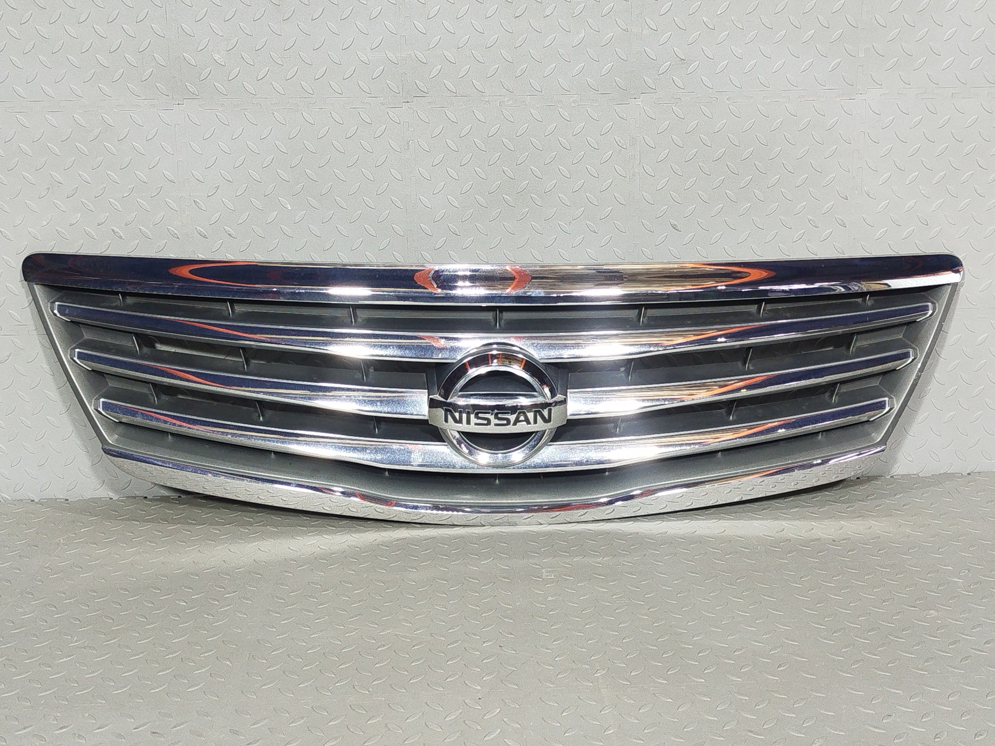РЕШЕТКА РАДИАТОРА NISSAN 62310JN00A KB2400Z