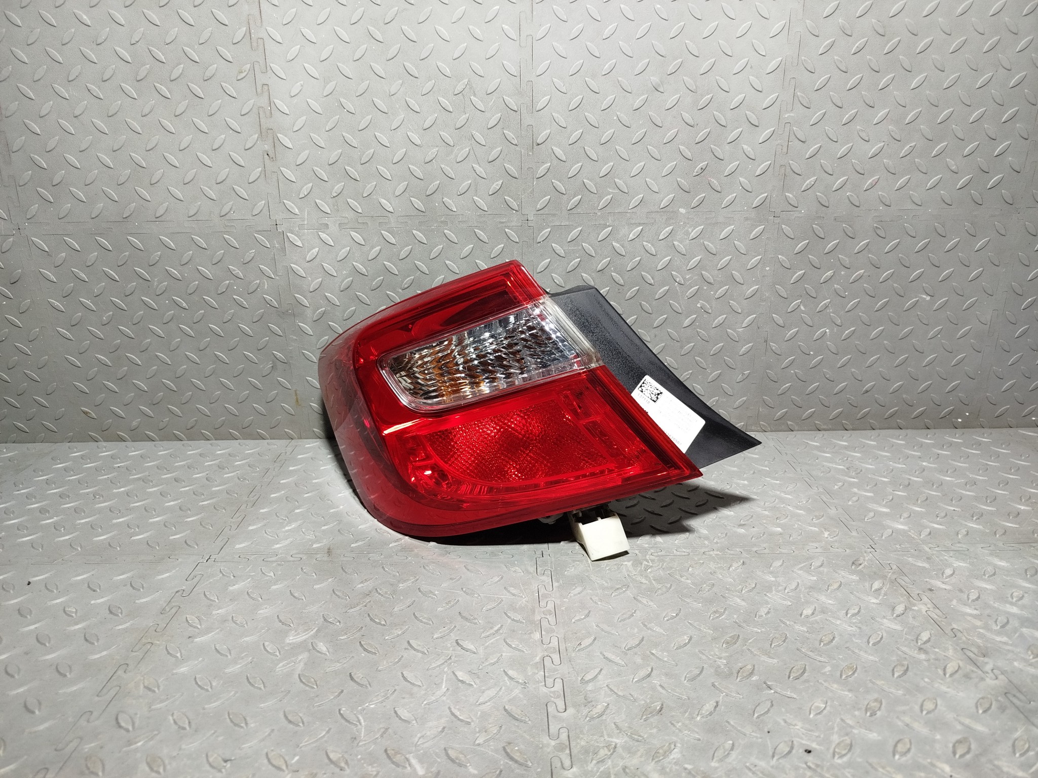 ФОНАРЬ TOYOTA DAIHATSU ЛЕВЫЙ 8156133550  FA1066