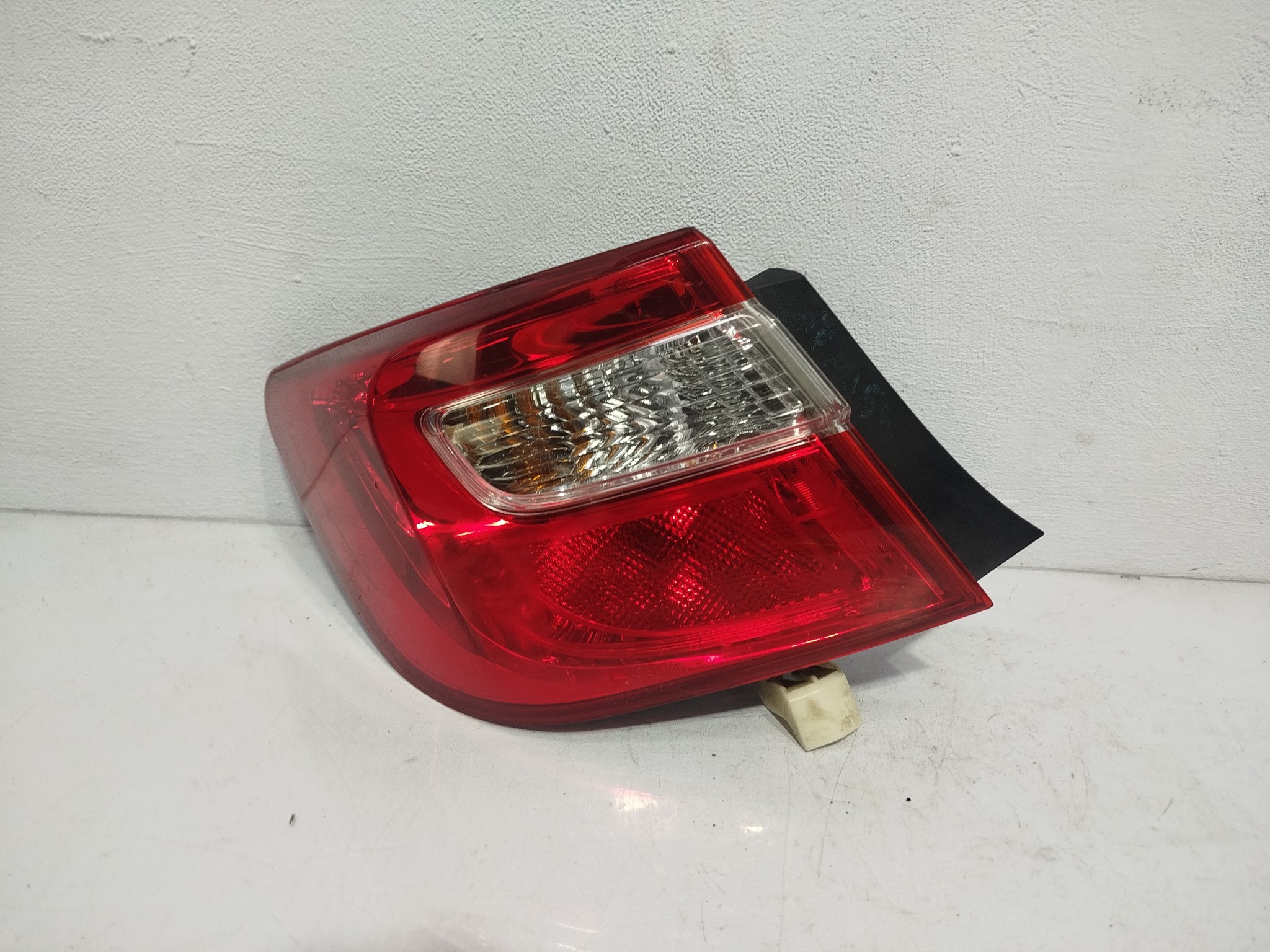 ФОНАРЬ TOYOTA DAIHATSU ЛЕВЫЙ 8156133550  FA1156