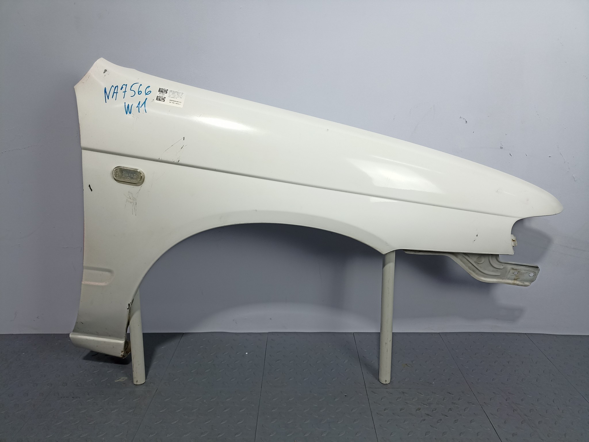 КРЫЛО NISSAN AVENIR EXPERT 63100WA000 ПЕРЕДНЕЕ ПРАВОЕ белый, QM1 NA7566