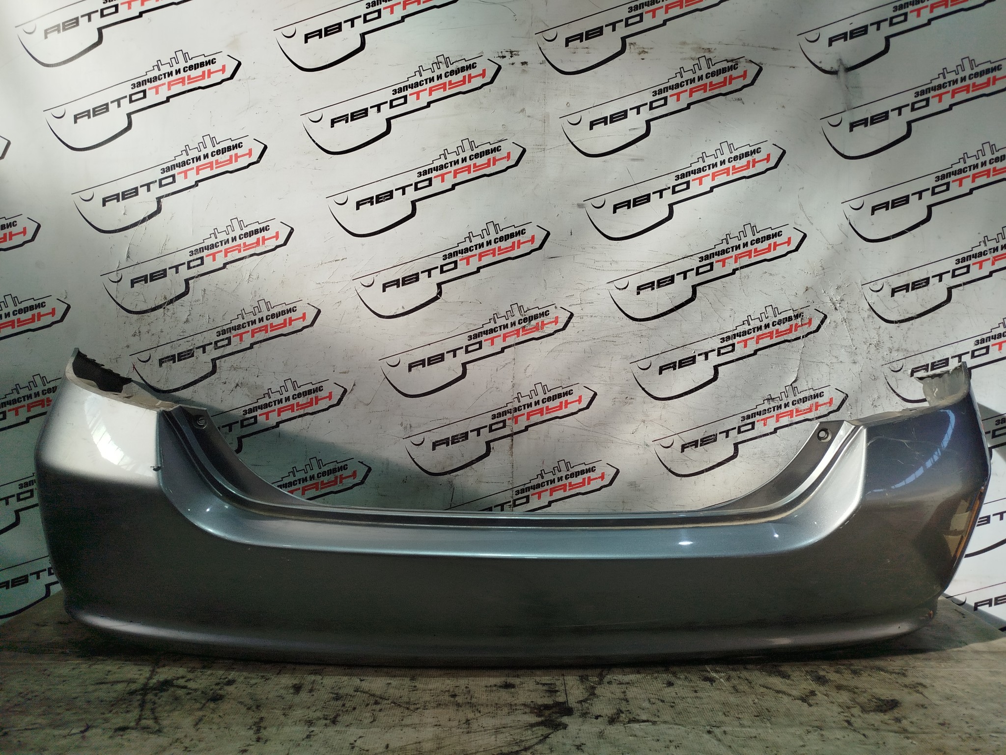 БАМПЕР HONDA FIT 71501SAA000ZA ЗАДНИЙ  серый, NH642M KA9343
