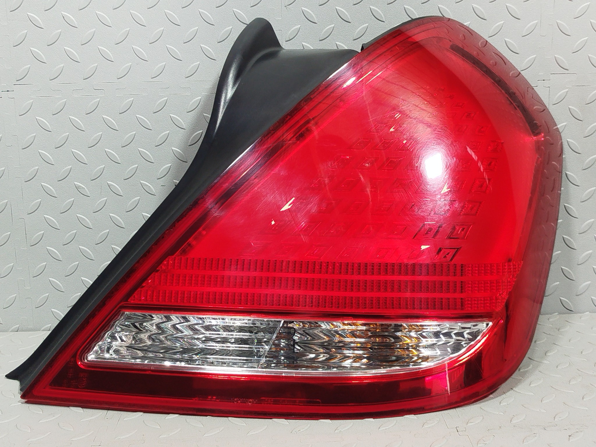 ФОНАРЬ NISSAN ПРАВЫЙ 265509Y025  S4390