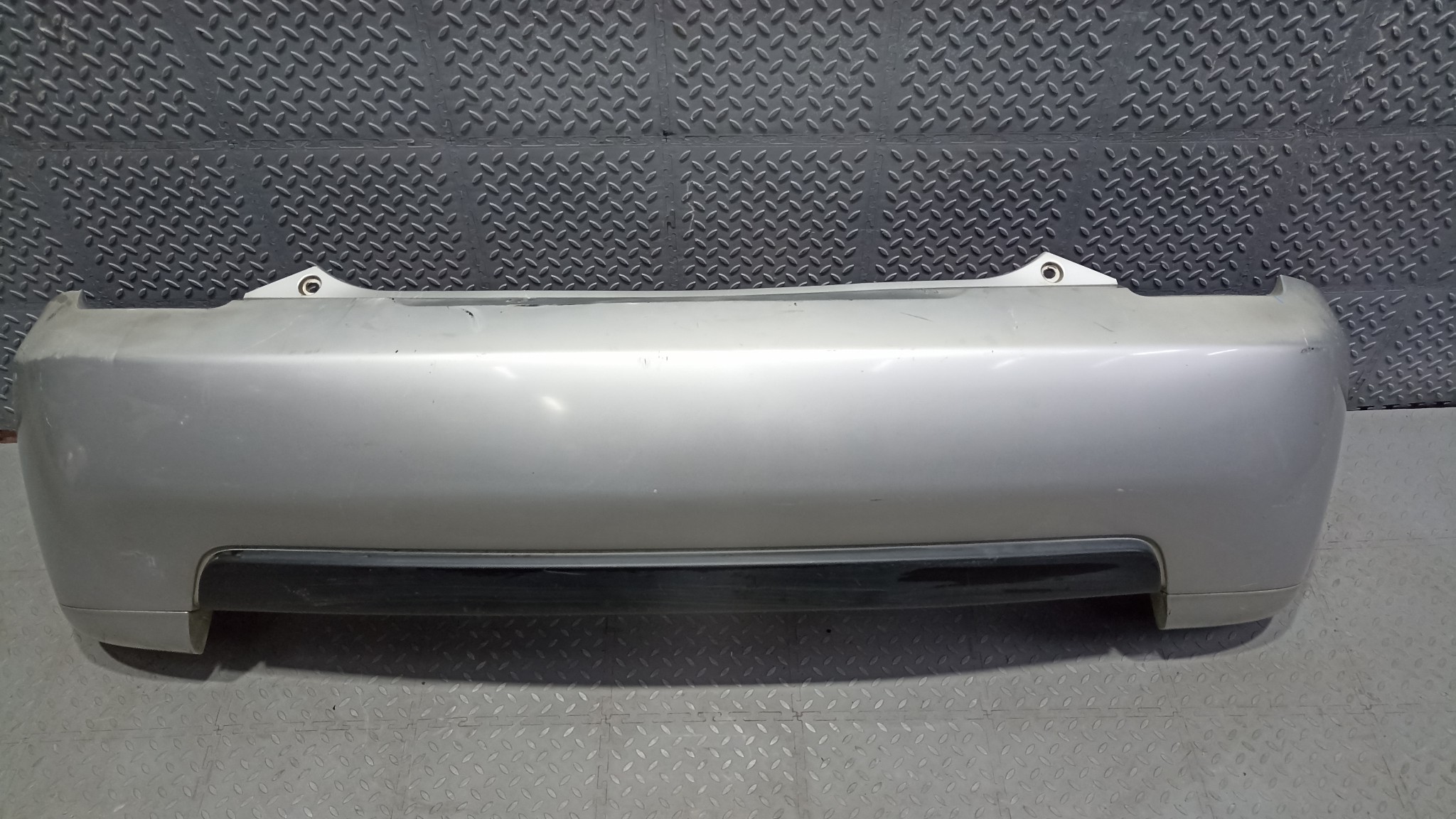 БАМПЕР TOYOTA SCION IST XA 5215952320D0 ЗАДНИЙ  серебро, 1E7 XE374