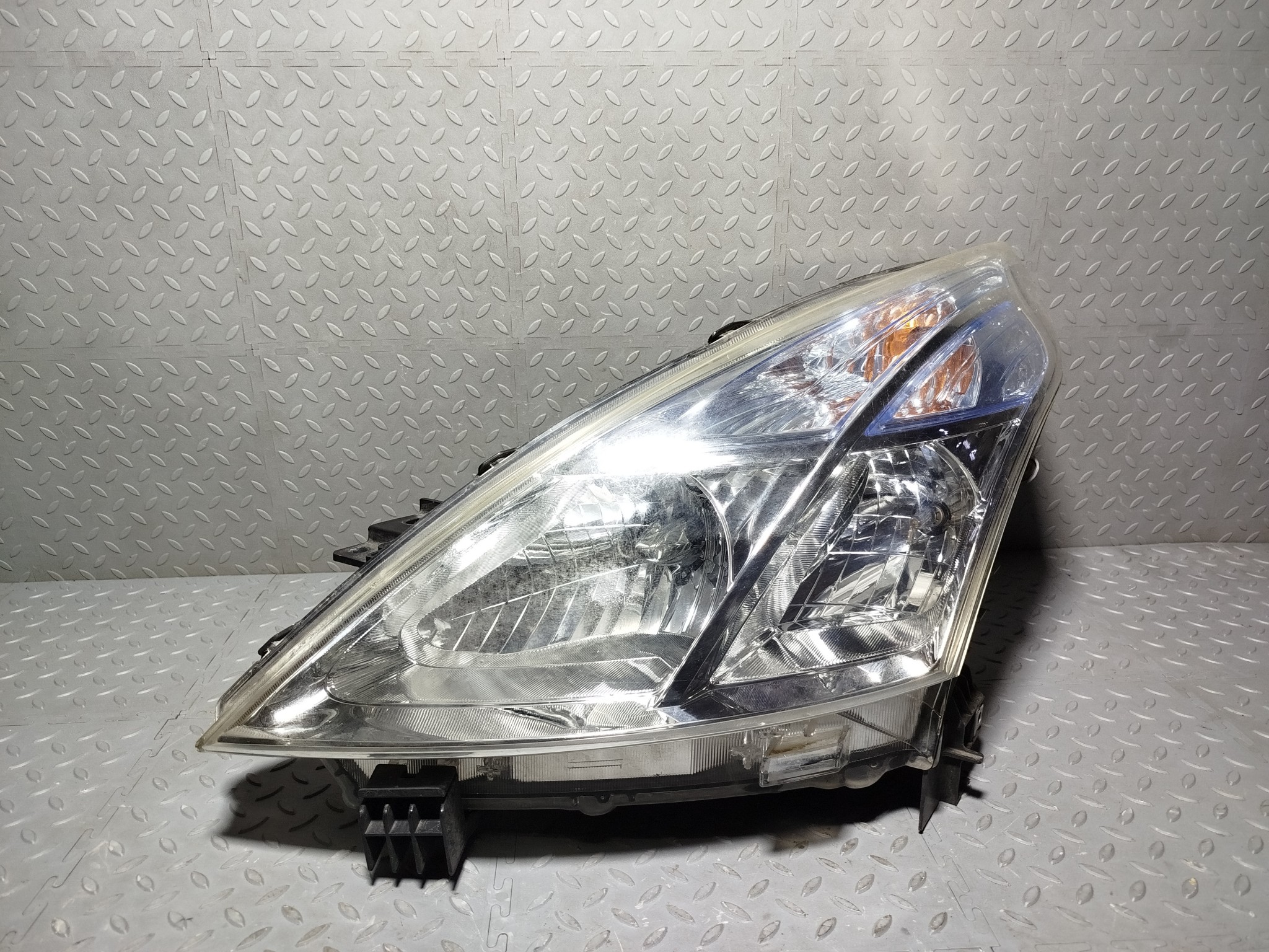 ФАРА NISSAN ЛЕВАЯ 26060JN20A  XA7839